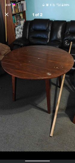 Round dinning table with two chairs