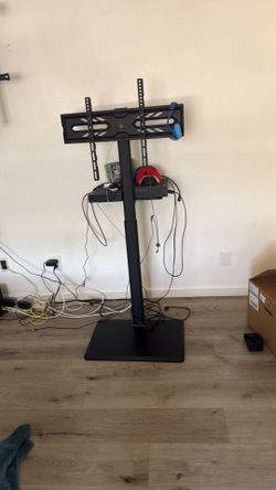 Tv stand   Can hold 70 inch