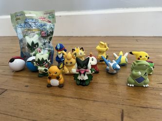 Pokemon figurines 1” tall.