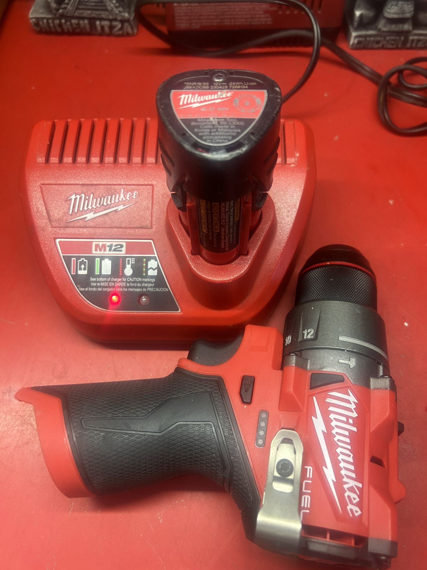 Milwaukee Fuel Impact Driver Used  Like New Battery Charger 