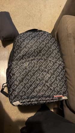 Used spray ground backpack