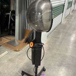 Standing hooded dryers.