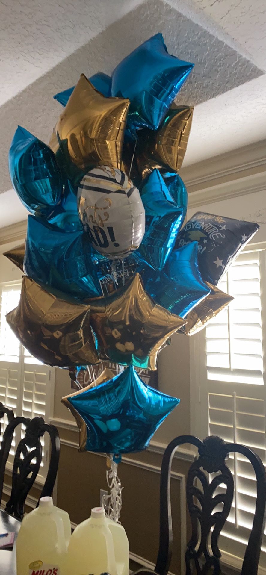 23 balloons Total, 3 are graduation balloons, .50 each
