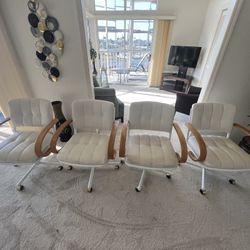 4 Leather Chairs With Wheels
