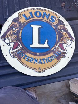 Vintage lions, man, cave gas, and oil fiberglass sign