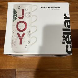 Set of 4 stackable mugs. Festive 'JOY' design.