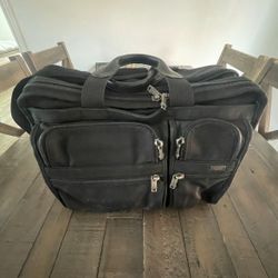 Tumi expandable laptop bag, in used condition.  