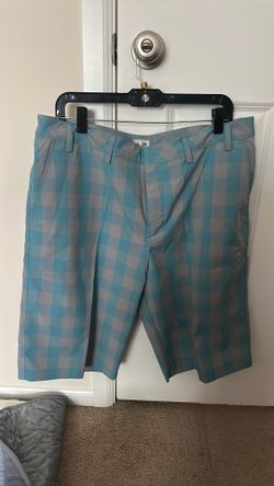 Adidas man golf shorts, size 36 , never worn , grey / blue color