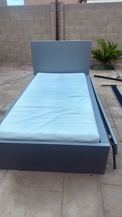Twin bed with mattress