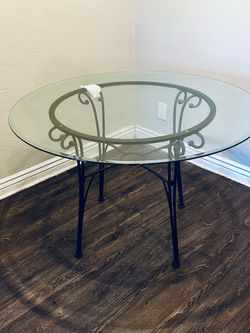 GLASS DINNING TABLE