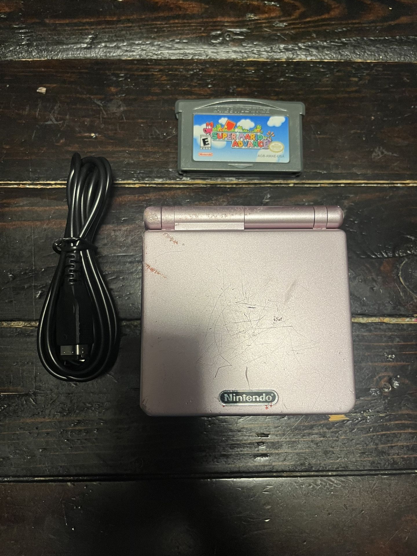 Game Boy Advance SP with Super Mario Advance Game, Charging Cord & New Battery