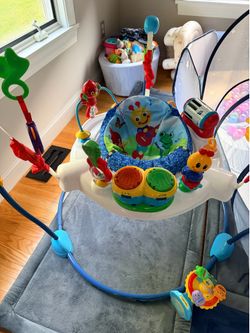 aby Einstein Neighborhood Symphony Activity Baby Jumper Activity Center, Infant Entertainer with Lights and  Melodies, Age 6 Months +, Max Weight 25 l