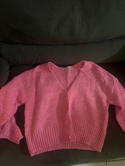Pink cardigan sweater