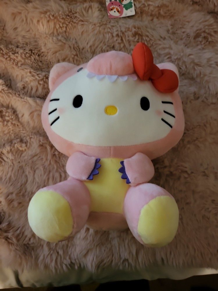 Hello Kitty In Pink Dinosaur Outfit