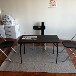 Table Chairs And Rug
