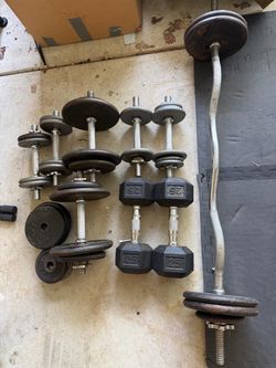Assorted weights and bench