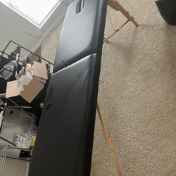 Massage table
