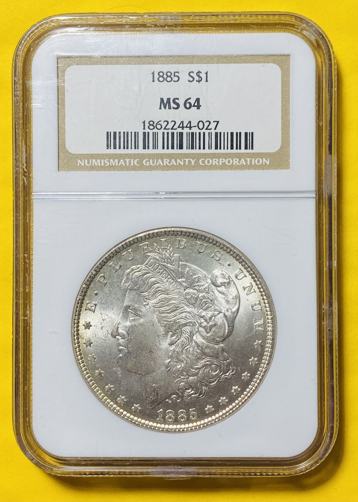 1885 MORGAN SILVER DOLLAR COIN (NGC-Graded MS64) Mint State, Uncirculated