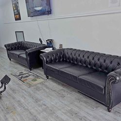 Two Black Luxury Looking Sofas 