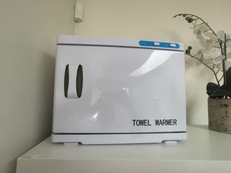 RTD-23A hot towel cabinet with UV sterilizer — 16L-ish capacity, the standard spa/esthetician unit
