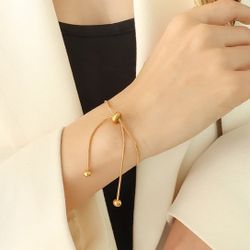 B80- Fashion Adjustable Pull-Out Bracelet Round Button!