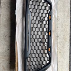 2016-2023 Toyota Tacoma Grille W/ LED Turn Signal Light & DRL Matte Black OEM