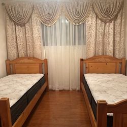 Two Twin Solid oak beds