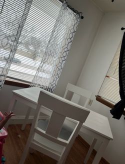 Kitchen table and AC.