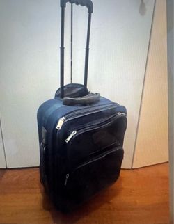 Navy blue carry-on luggage