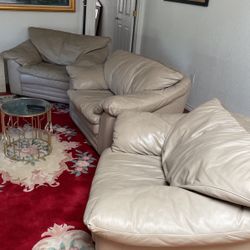 Three Arm Chairs And A Rocking Chair