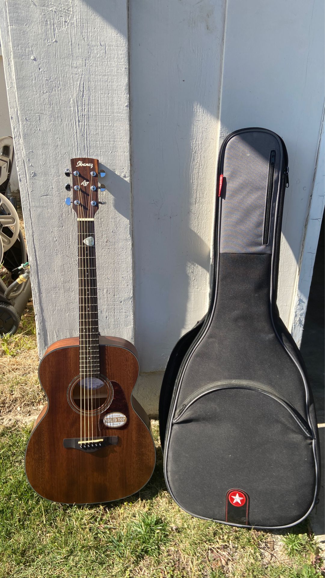 Ibanez solid wood acoustic guitar. Never used—perfect condition