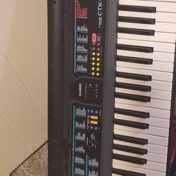 Keyboard With Stand (Missing Power Chord Can Order Online For $12)