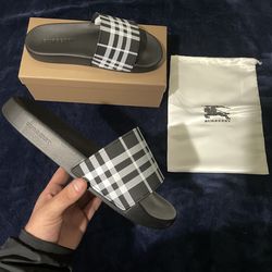 Black Burberry slides