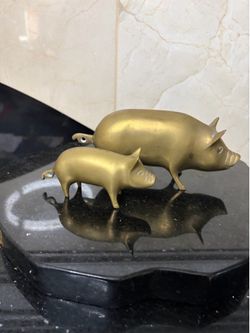 Two vintage brass pig 5”& 7”