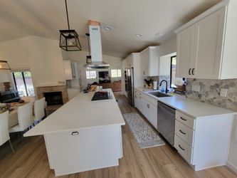 Full Kitchen Remodel: White Shaker Cabinets, Quartz Waterfall Island