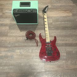 Jackson Transparent Red Guitar With Amp