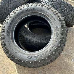  (4) Goodyear Wrangler AT LT275/65R18 80% Tread load C Trail Boss Yukon at4 tires