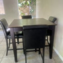 The Table Which Four Chairs 