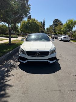 Mercedes-Benz White Sedan with AMG Front Bumper