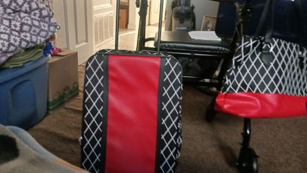 Matching rolling suitcase and a carry on bag