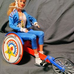 Collectable: 1999 and 2002 Barbie and Becky. 