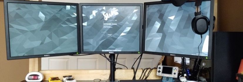 3 Dell Computer Monitors With Monitor Stand