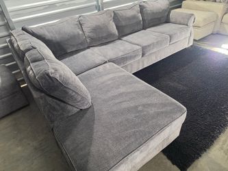 Nice Gray Sectional with Storage Ottoman