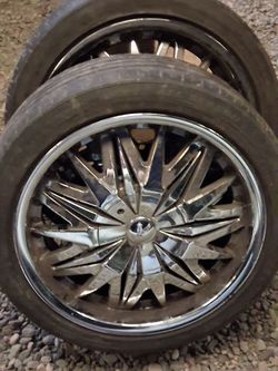 Four lug , universal eighteen inch rims and tires like new