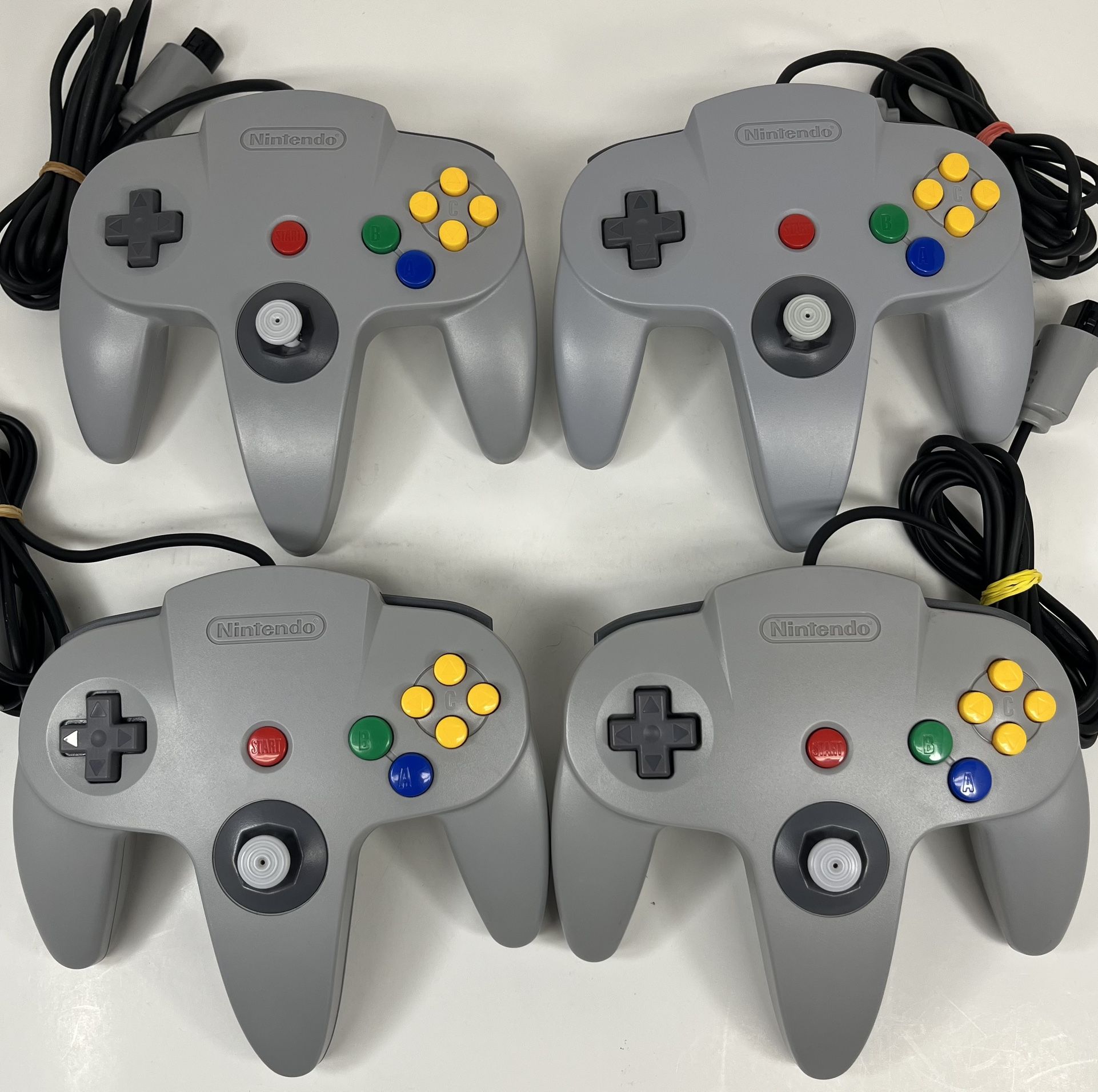 Four OEM Nintendo N64 Controller Bundle Original Gray