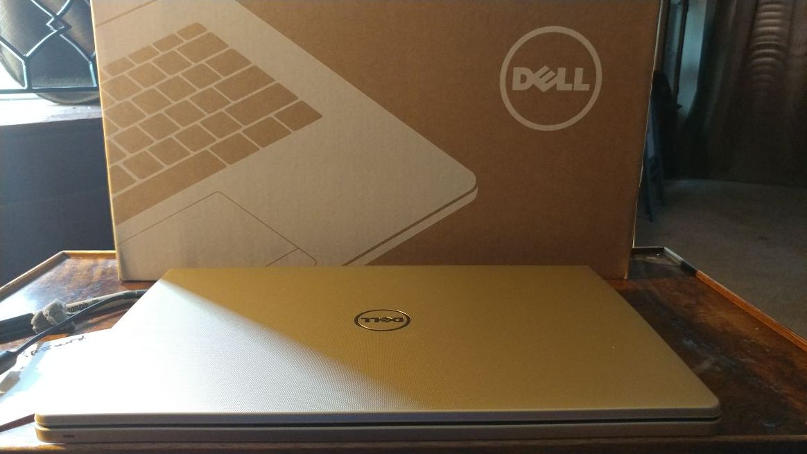 Like new condition gold color Dell Inspiron 15 5000 series laptop one terabyte hard drive