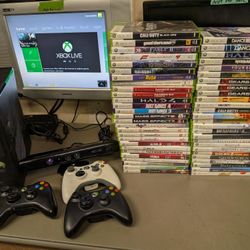 Xbox 360 with 250gb hard drive, 3 controllers, Kinect sensor and over 50 games
