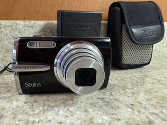 OLYMPUS Stylus 1010 10MP Digital Camera with 7x Optical Dual Image Stabilized Zoom (Black)