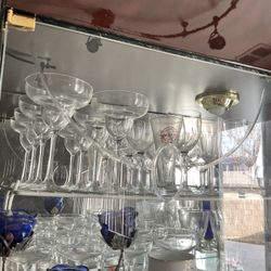 Elegant big collection of drink ware glasses great for dessert, fruit, wine, jello, cocktails, ice cream different brands and styles most of them neve