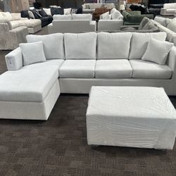 New Cream White Sectional And Ottoman 